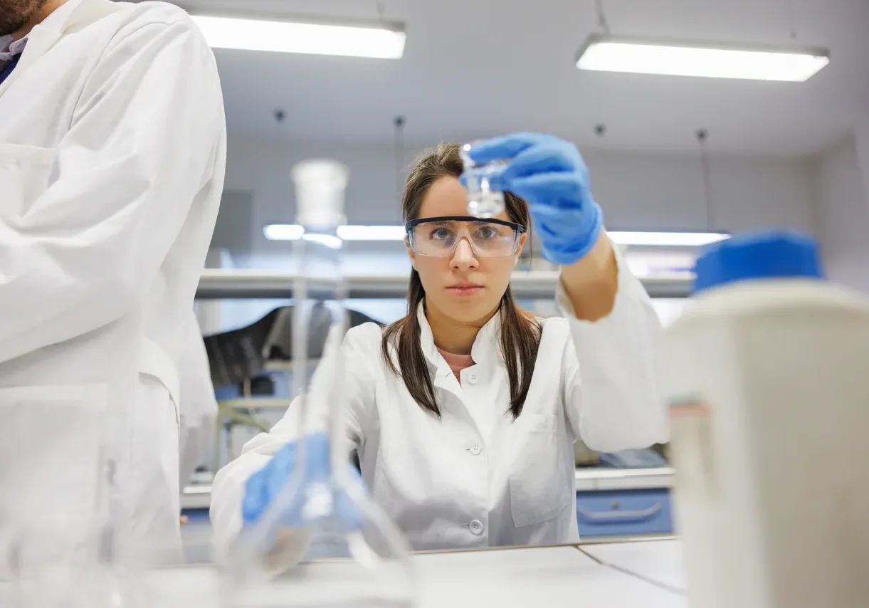 Lab technician analyzing sample