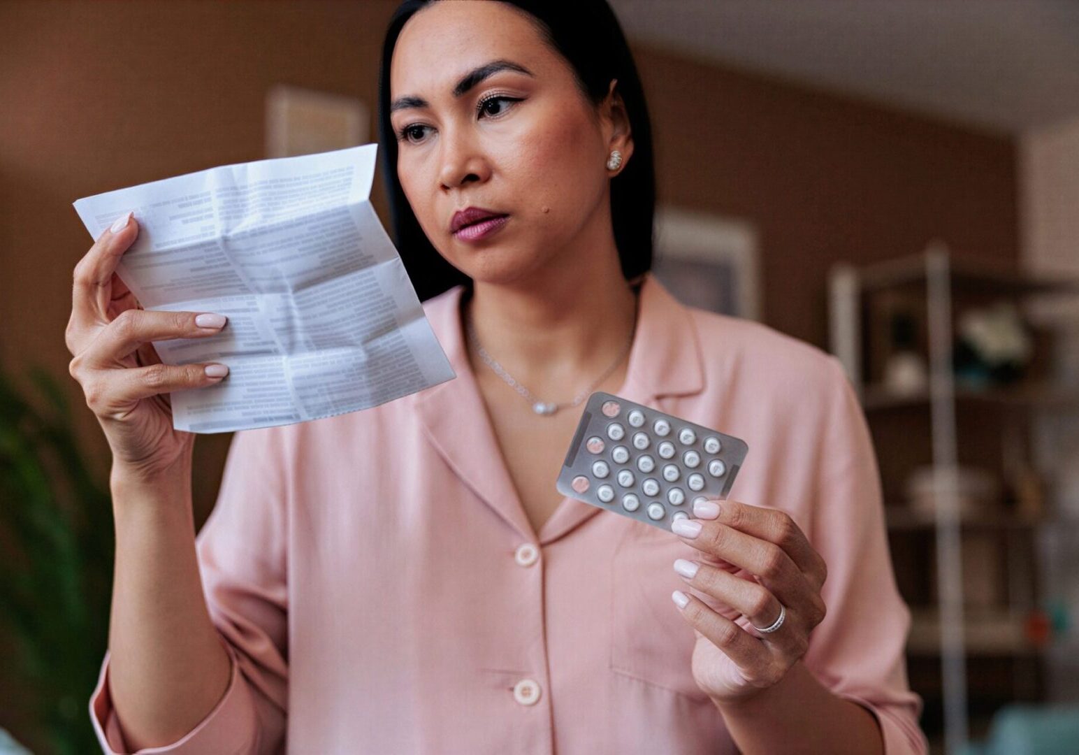 Individual examining medicine information sheet